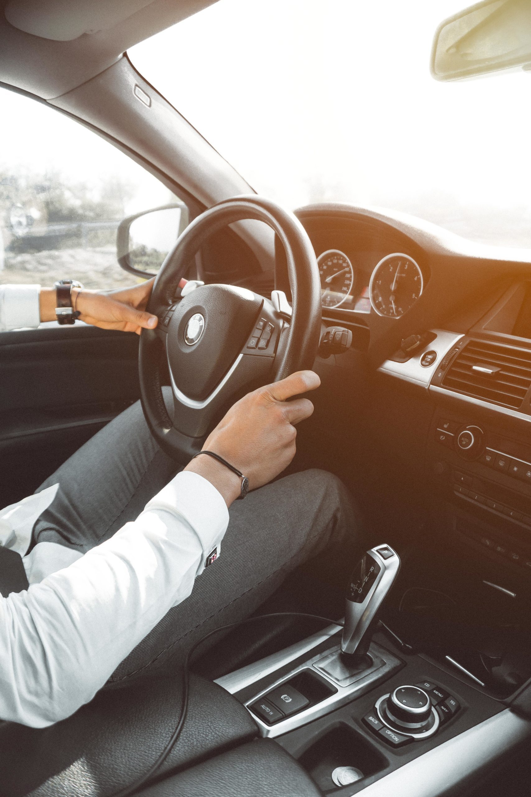 Consumer finance perth page driving car image - holding steering