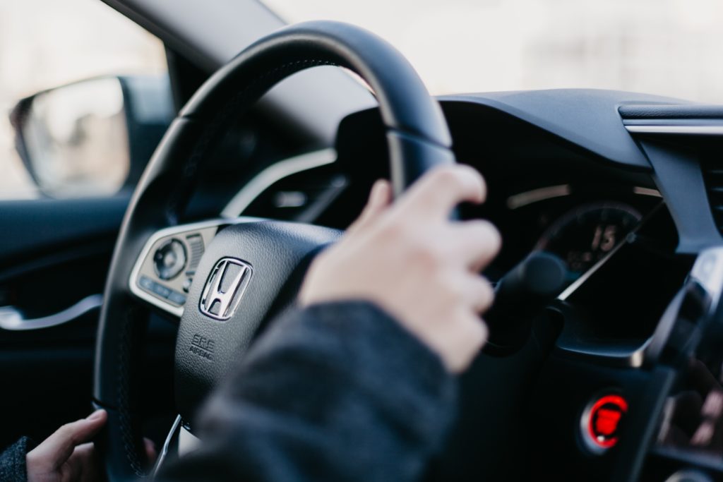 Car Driver holding steering image