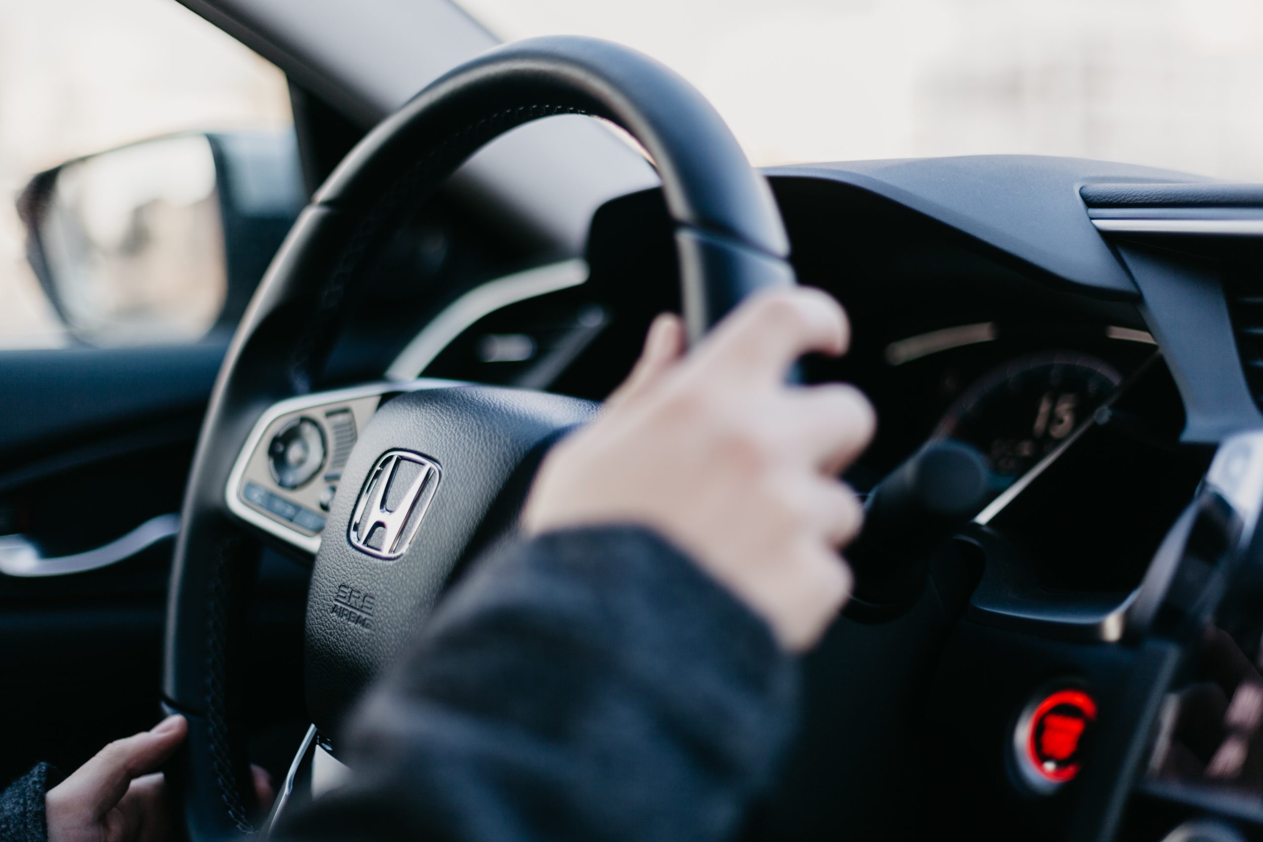 Car Driver holding steering image